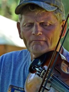 fiddler playing man